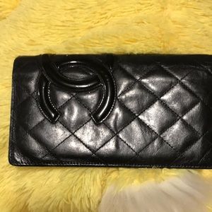 Crossbody Chanel wallet I sometimes put my iPhone in its pocket I hate to part